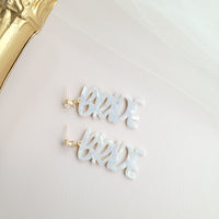 Shop Bride Earrings-Celebrate the bride-to-be with lightweight acrylic Bride earrings featuring zircon studs and gold-plated brass. Perfect for showers, photos, and parties.-available at Reef Love online boho-chic boutique