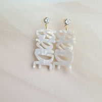 Shop Bride Earrings-Celebrate the bride-to-be with lightweight acrylic Bride earrings featuring zircon studs and gold-plated brass. Perfect for showers, photos, and parties.-available at Reef Love online boho-chic boutique
