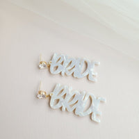Shop Bride Earrings-Celebrate the bride-to-be with lightweight acrylic Bride earrings featuring zircon studs and gold-plated brass. Perfect for showers, photos, and parties.-available at Reef Love online boho-chic boutique