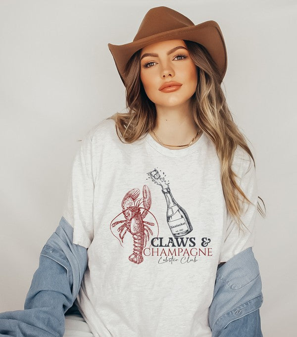 Claws & Champagne Lobster Club Graphic Top Tee-Cozy up in this Claws & Champagne graphic tee—coastal brunch vibes meet Maine lobster boil sass. Lightweight, cheeky, and perfect for sunny summer days.-Reef Love