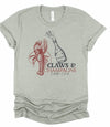 Claws & Champagne Lobster Club Graphic Top Tee-Cozy up in this Claws & Champagne graphic tee—coastal brunch vibes meet Maine lobster boil sass. Lightweight, cheeky, and perfect for sunny summer days.-Reef Love