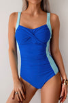 Shop Colorblock Spliced Halter One Piece Swimsuit-Colorblock halter one-piece swimsuit with bold print and bust support, extended sizes. Flattering fit, stretchy fabric, for beach days, pool parties, and vacations.-available at Reef Love online boho-chic boutique