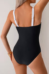 Shop Colorblock Spliced Halter One Piece Swimsuit-Colorblock halter one-piece swimsuit with bold print and bust support, extended sizes. Flattering fit, stretchy fabric, for beach days, pool parties, and vacations.-available at Reef Love online boho-chic boutique