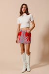 Contrast Bow Knot Pocket Fourth Of July Denim Skirt-Red & white striped denim mini skirt with bow knot detail & pockets. High-waisted & lightweight for summer fun—perfect for Fourth of July & casual styling.-Reef Love Boho-Chic Boutique