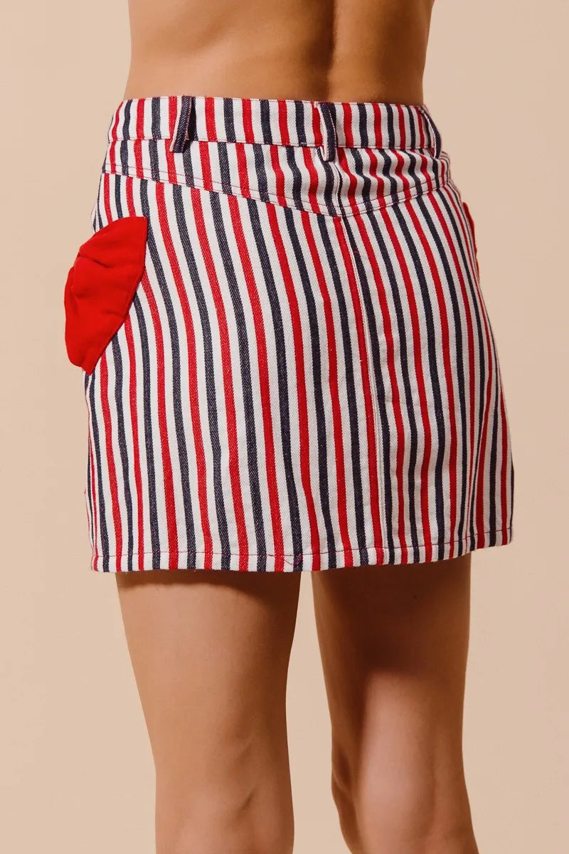 Contrast Bow Knot Pocket Fourth Of July Denim Skirt-Red & white striped denim mini skirt with bow knot detail & pockets. High-waisted & lightweight for summer fun—perfect for Fourth of July & casual styling.-Reef Love Boho-Chic Boutique
