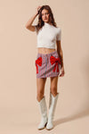 Contrast Bow Knot Pocket Fourth Of July Denim Skirt-Red & white striped denim mini skirt with bow knot detail & pockets. High-waisted & lightweight for summer fun—perfect for Fourth of July & casual styling.-Reef Love Boho-Chic Boutique