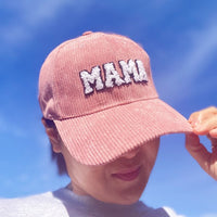 Corduroy Mama Baseball Cap-Adorable corduroy MAMA ball cap with fuzzy patch lettering. Has great fit with perfect curved brim. Clip closure on the back to adjust size and hidden pocket.