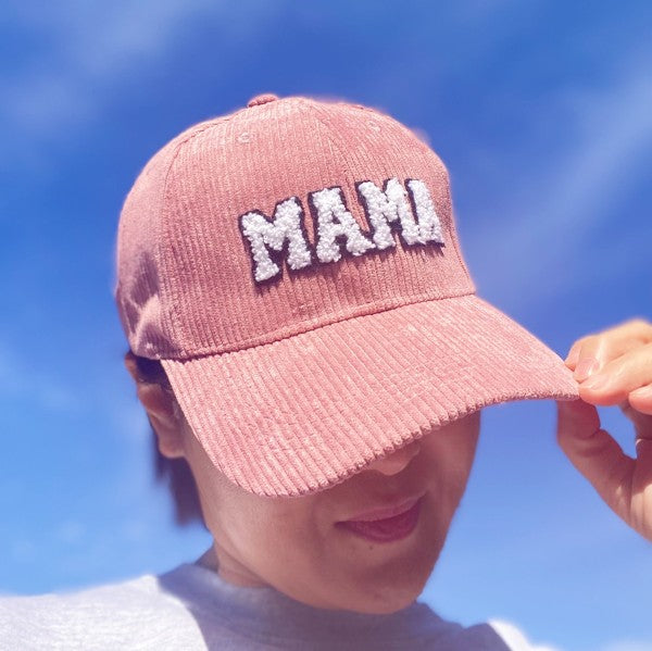 Corduroy Mama Baseball Cap-Adorable corduroy MAMA ball cap with fuzzy patch lettering. Has great fit with perfect curved brim. Clip closure on the back to adjust size and hidden pocket.