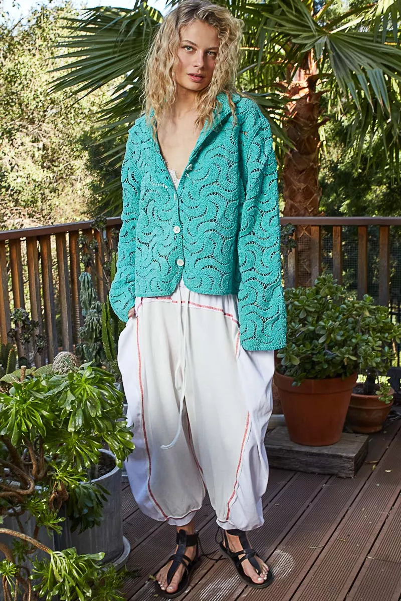 Crochet Lace Openwork Cardigan-Crochet Lace Openwork Cardigan. This button-down lace crochet cardigan features a crochet openwork design for a touch of bohemian style. Perfect for layering.