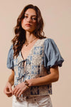 Shop Crochet Lace Tie Front V Neck Blouse-Boho-chic lace tie front blouse with vintage patchwork print & puff sleeves. Lightweight & airy, perfect for summer outings & coastal-inspired looks.-available at Reef Love online boho-chic boutique