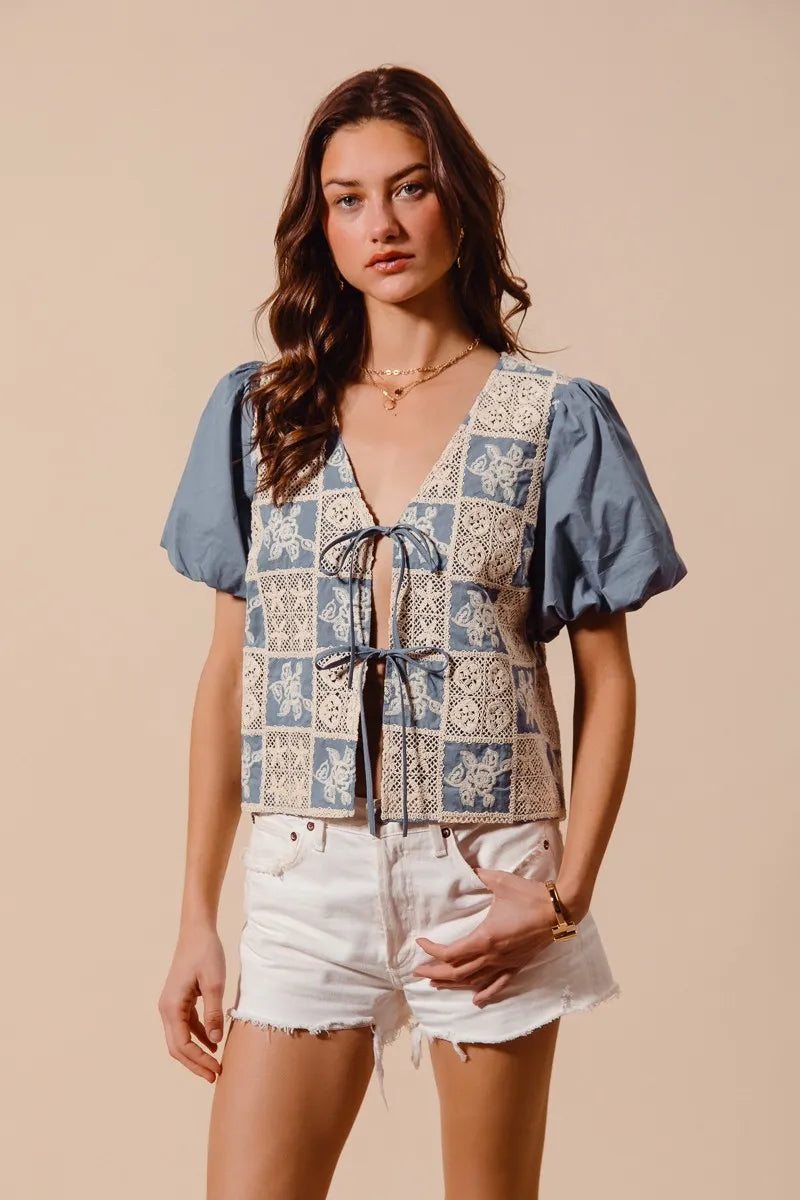 Shop Crochet Lace Tie Front V Neck Blouse-Boho-chic lace tie front blouse with vintage patchwork print & puff sleeves. Lightweight & airy, perfect for summer outings & coastal-inspired looks.-available at Reef Love online boho-chic boutique