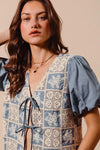 Shop Crochet Lace Tie Front V Neck Blouse-Boho-chic lace tie front blouse with vintage patchwork print & puff sleeves. Lightweight & airy, perfect for summer outings & coastal-inspired looks.-available at Reef Love online boho-chic boutique
