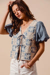 Shop Crochet Lace Tie Front V Neck Blouse-Boho-chic lace tie front blouse with vintage patchwork print & puff sleeves. Lightweight & airy, perfect for summer outings & coastal-inspired looks.-available at Reef Love online boho-chic boutique