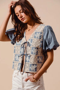 Shop Crochet Lace Tie Front V Neck Blouse-Boho-chic lace tie front blouse with vintage patchwork print & puff sleeves. Lightweight & airy, perfect for summer outings & coastal-inspired looks.-available at Reef Love online boho-chic boutique