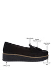 Daiki platform lug sole tassel loafers in soft micro suede with cushioned insole. A chic, edgy update to classic loafers