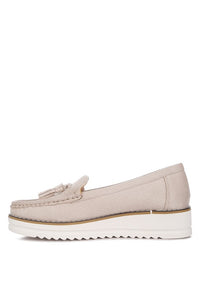 Daiki platform lug sole tassel loafers in soft micro suede with cushioned insole.