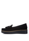 Daiki platform lug sole tassel loafers in soft micro suede with cushioned insole. A chic, edgy update to classic loafers