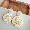 Shop Dominica Earrings - Light Rattan-Lightweight hand-woven light rattan earrings with hypoallergenic posts. Easy, earthy style perfect for everyday wear, travel, and warm-weather outfits.-available at Reef Love online boho-chic boutique