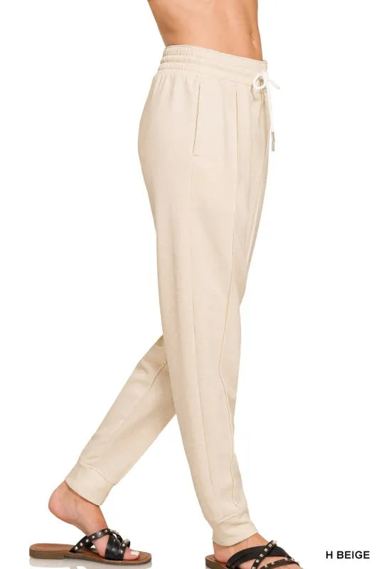 Shop Drawstring Scuba Sweatpants with Pockets-Sleek and comfy drawstring scuba sweatpants with pockets and a relaxed fit. Perfect for elevated loungewear, travel, or casual days out.-available at Reef Love online boho-chic boutique