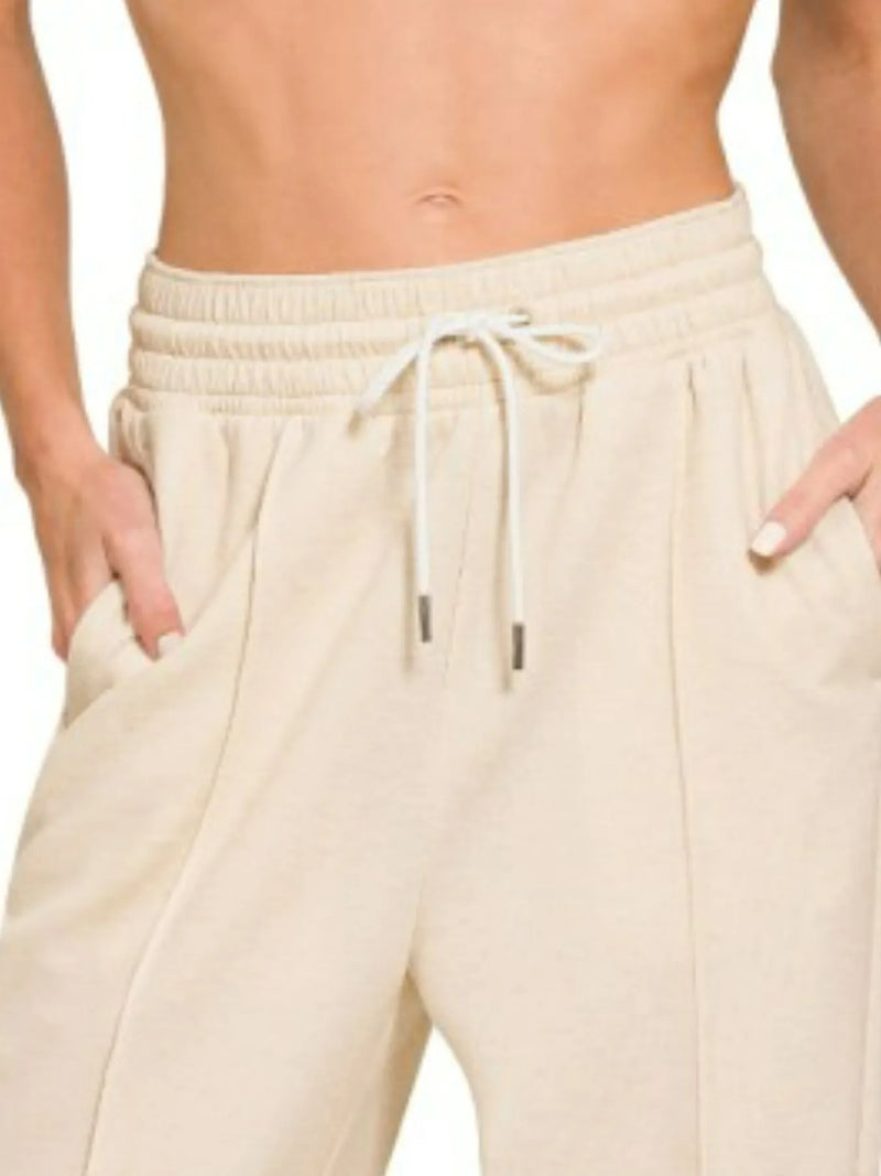 Shop Drawstring Scuba Sweatpants with Pockets-Sleek and comfy drawstring scuba sweatpants with pockets and a relaxed fit. Perfect for elevated loungewear, travel, or casual days out.-available at Reef Love online boho-chic boutique