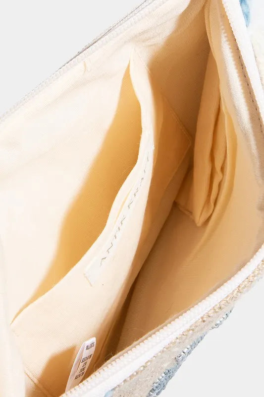 Evil Eye Fringe Cosmetic Bag-The Evil Eye Fringe Cosmetic Bag is a stylish and chic accessory featuring the iconic evil eye design and trendy fringe embellishments. 