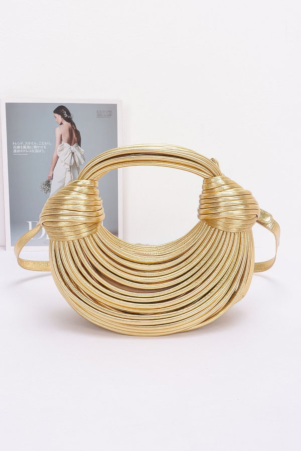 gold Faux Leather Rope Hobo Bag. Featuring a modern design with faux leather and mixed metal accents