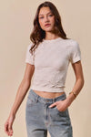 Shop Floral Patterned Seamless T-Shirt-A floral patterned seamless short sleeve top is a stylish and comfortable piece of clothing that combines a classic floral design with the seamless construction-available at Reef Love online boho-chic boutique