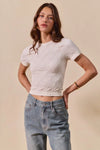 Shop Floral Patterned Seamless T-Shirt-A floral patterned seamless short sleeve top is a stylish and comfortable piece of clothing that combines a classic floral design with the seamless construction-available at Reef Love online boho-chic boutique