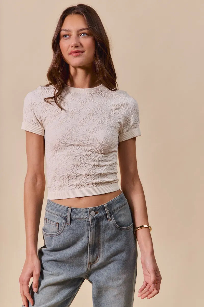 Shop Floral Patterned Seamless T-Shirt-A floral patterned seamless short sleeve top is a stylish and comfortable piece of clothing that combines a classic floral design with the seamless construction-available at Reef Love online boho-chic boutique