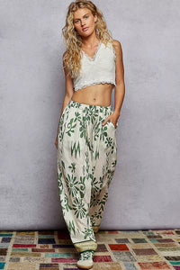 Floral Printed Woven Wide Leg Drawstring Pants-Green and Beige Floral Printed Woven Wide Leg Drawstring Pants. The Wide Leg Drawstring Pants are a chic and stylish choice for any fashion-forward individual. 