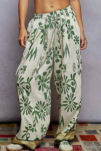 Floral Printed Woven Wide Leg Drawstring Pants-Green and Beige Floral Printed Woven Wide Leg Drawstring Pants. The Wide Leg Drawstring Pants are a chic and stylish choice for any fashion-forward individual. 