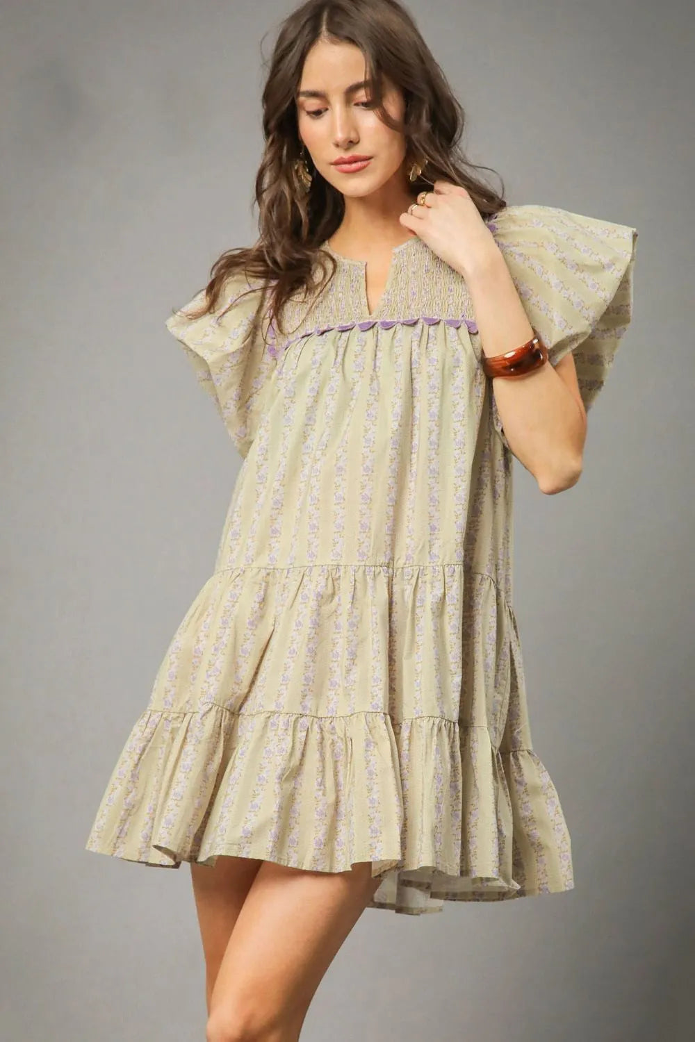 Floral Ruffled Cap Sleeve Tiered Mini Dress-charming flutter sleeve tiered mini dress features a delicate floral print on soft, breathable fabric. design showcases flutter sleeves, V-neckline and relaxed fit.-Reef Love Boho-Chic Boutique