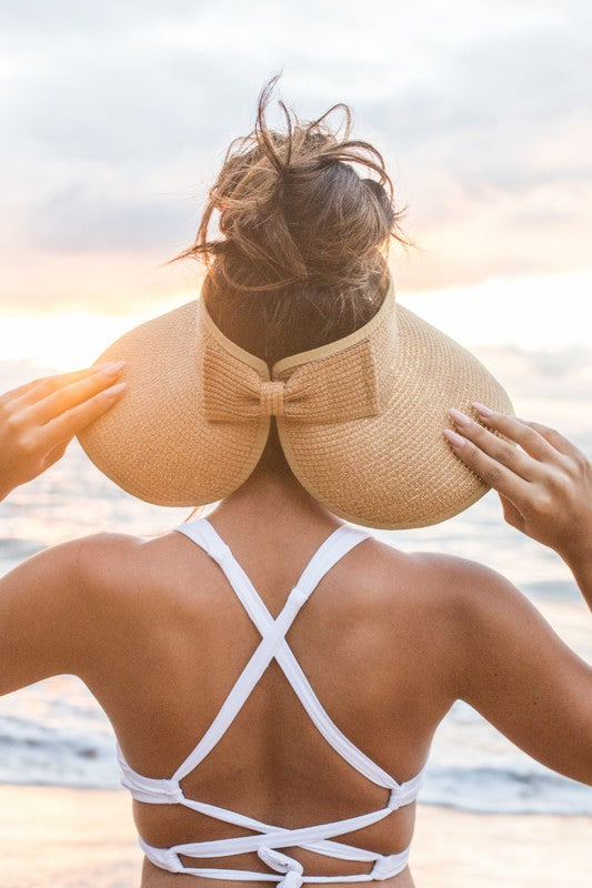Foldable Wide Brim Straw Sun Visor, the perfect accessory for sunny days, beach getaways, and everyday outdoor adventures. Crafted from 100% breathable straw, this lightweight women’s sun hat