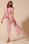 Shop Front Tie Stripe Top and Wide Leg Pants Set-Pink & white striped two-piece set with tie-front blouse & wide-leg pants. Lightweight & breezy for summer days, perfect for effortless feminine style.-available at Reef Love online boho-chic boutique