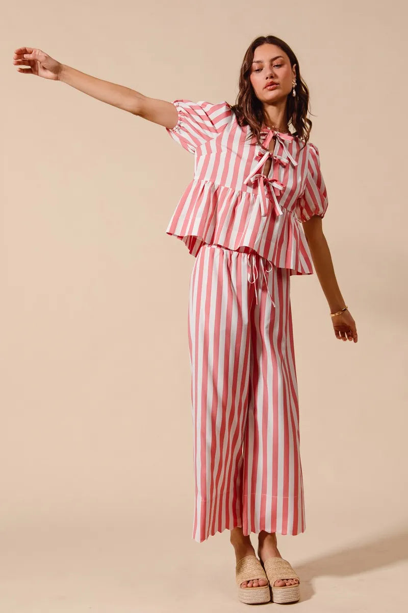 Shop Front Tie Stripe Top and Wide Leg Pants Set-Pink & white striped two-piece set with tie-front blouse & wide-leg pants. Lightweight & breezy for summer days, perfect for effortless feminine style.-available at Reef Love online boho-chic boutique