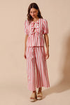Shop Front Tie Stripe Top and Wide Leg Pants Set-Pink & white striped two-piece set with tie-front blouse & wide-leg pants. Lightweight & breezy for summer days, perfect for effortless feminine style.-available at Reef Love online boho-chic boutique