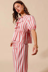Shop Front Tie Stripe Top and Wide Leg Pants Set-Pink & white striped two-piece set with tie-front blouse & wide-leg pants. Lightweight & breezy for summer days, perfect for effortless feminine style.-available at Reef Love online boho-chic boutique