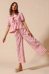 Shop Front Tie Stripe Top and Wide Leg Pants Set-Pink & white striped two-piece set with tie-front blouse & wide-leg pants. Lightweight & breezy for summer days, perfect for effortless feminine style.-available at Reef Love online boho-chic boutique