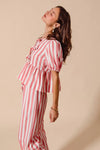 Shop Front Tie Stripe Top and Wide Leg Pants Set-Pink & white striped two-piece set with tie-front blouse & wide-leg pants. Lightweight & breezy for summer days, perfect for effortless feminine style.-available at Reef Love online boho-chic boutique
