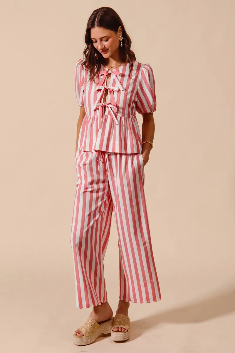 Shop Front Tie Stripe Top and Wide Leg Pants Set-Pink & white striped two-piece set with tie-front blouse & wide-leg pants. Lightweight & breezy for summer days, perfect for effortless feminine style.-available at Reef Love online boho-chic boutique
