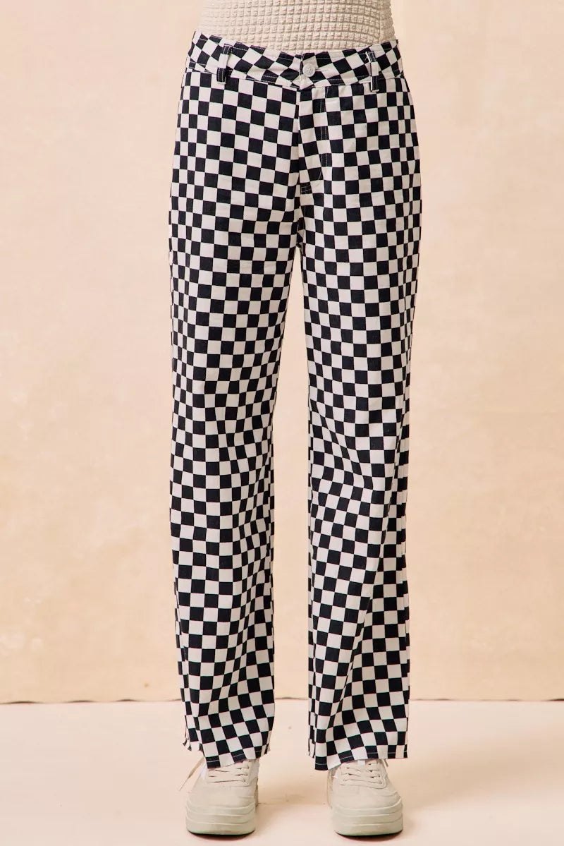 Gameday Theme Black & White Checkered Print Pants-Black & white checkered gameday pants. Relaxed straight-leg fit in breathable cotton. Fun, sporty style perfect for gameday outfits or casual streetwear.