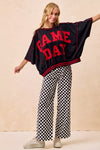 Gameday Theme Black & White Checkered Print Pants-Black & white checkered gameday pants. 