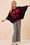 Black & white checkered women's pants. Fun, sporty style perfect for gameday outfits or casual streetwear.