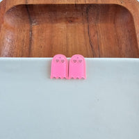 Shop Ghost Studs - Pink Glitter-Pink glitter ghost stud earrings with hypoallergenic posts. Light, sparkly, and spooky-cute—perfect for Halloween or showing off your playful ghost-loving side.-available at Reef Love online boho-chic boutique