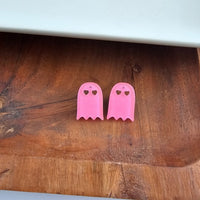 Shop Ghost Studs - Pink Glitter-Pink glitter ghost stud earrings with hypoallergenic posts. Light, sparkly, and spooky-cute—perfect for Halloween or showing off your playful ghost-loving side.-available at Reef Love online boho-chic boutique