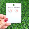 Shop Glitter Baseball Stud Earrings-Sparkly baseball stud earrings with red stitching and hypoallergenic posts. Lightweight and fun—perfect for sporty style, fans, and game day looks.-available at Reef Love online boho-chic boutique