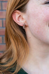 Shop Glitter Football Stud Earrings-Glitter football stud earrings with hypoallergenic posts. Lightweight, sparkly, and perfect for fans, tailgates, and showing your team spirit in style.-available at Reef Love online boho-chic boutique