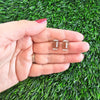 Shop Glitter Football Stud Earrings-Glitter football stud earrings with hypoallergenic posts. Lightweight, sparkly, and perfect for fans, tailgates, and showing your team spirit in style.-available at Reef Love online boho-chic boutique