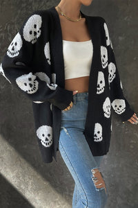 Shop Halloween Skull Print Knit Cardigan-Cozy, Bold & Spooky-Chic Add a bold, seasonal twist to your layers with the Halloween Skull Print Knit Cardigan — a must-have for spooky season lovers. -available at Reef Love online boho-chic boutique