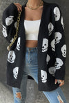 Shop Halloween Skull Print Knit Cardigan-Cozy, Bold & Spooky-Chic Add a bold, seasonal twist to your layers with the Halloween Skull Print Knit Cardigan — a must-have for spooky season lovers. -available at Reef Love online boho-chic boutique